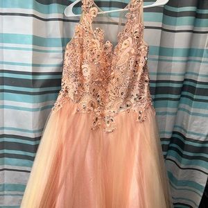 It’s a xl prom dress it fits a 12-18 because of the corsette on the back